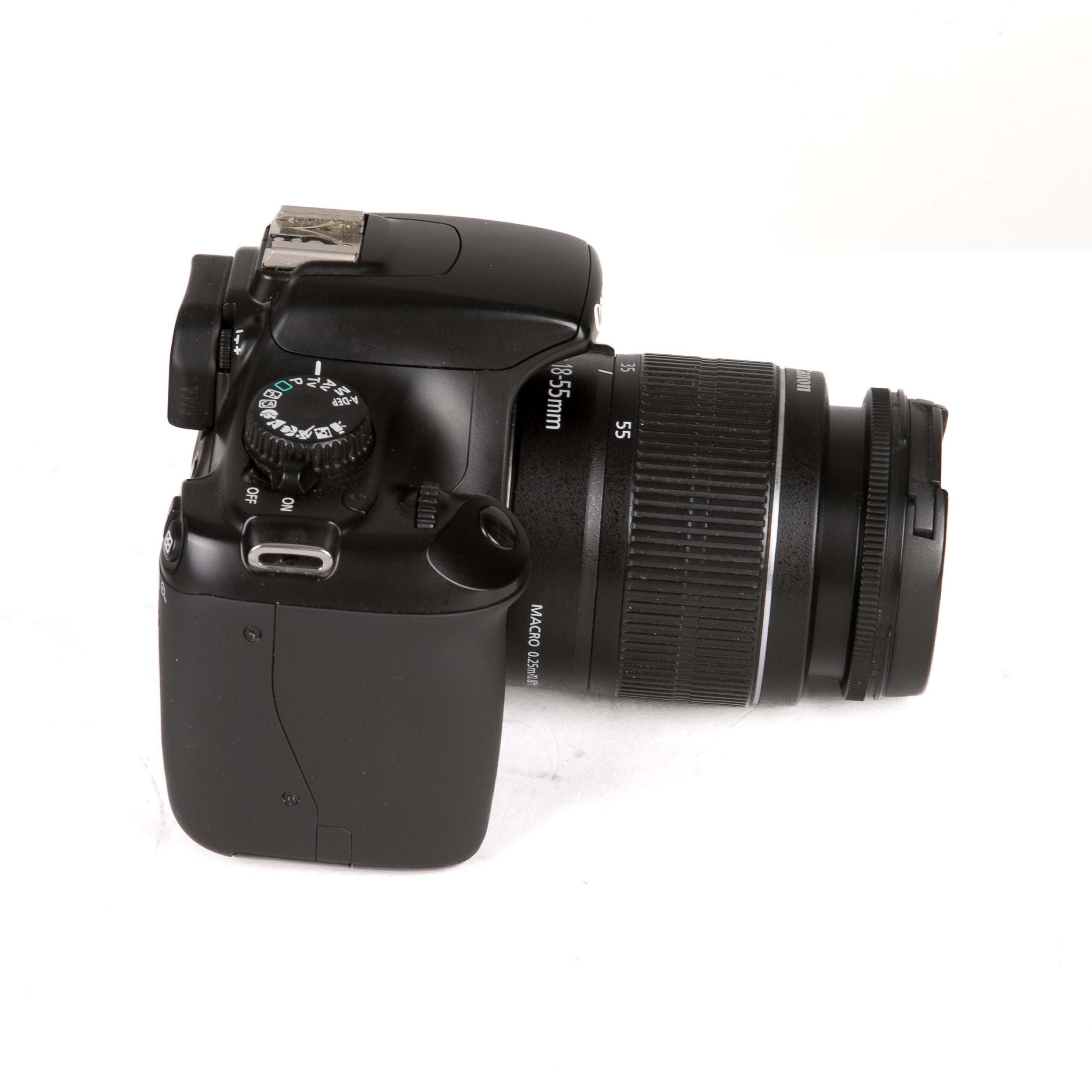 Canon EOS 1100D + 18-55 DC III