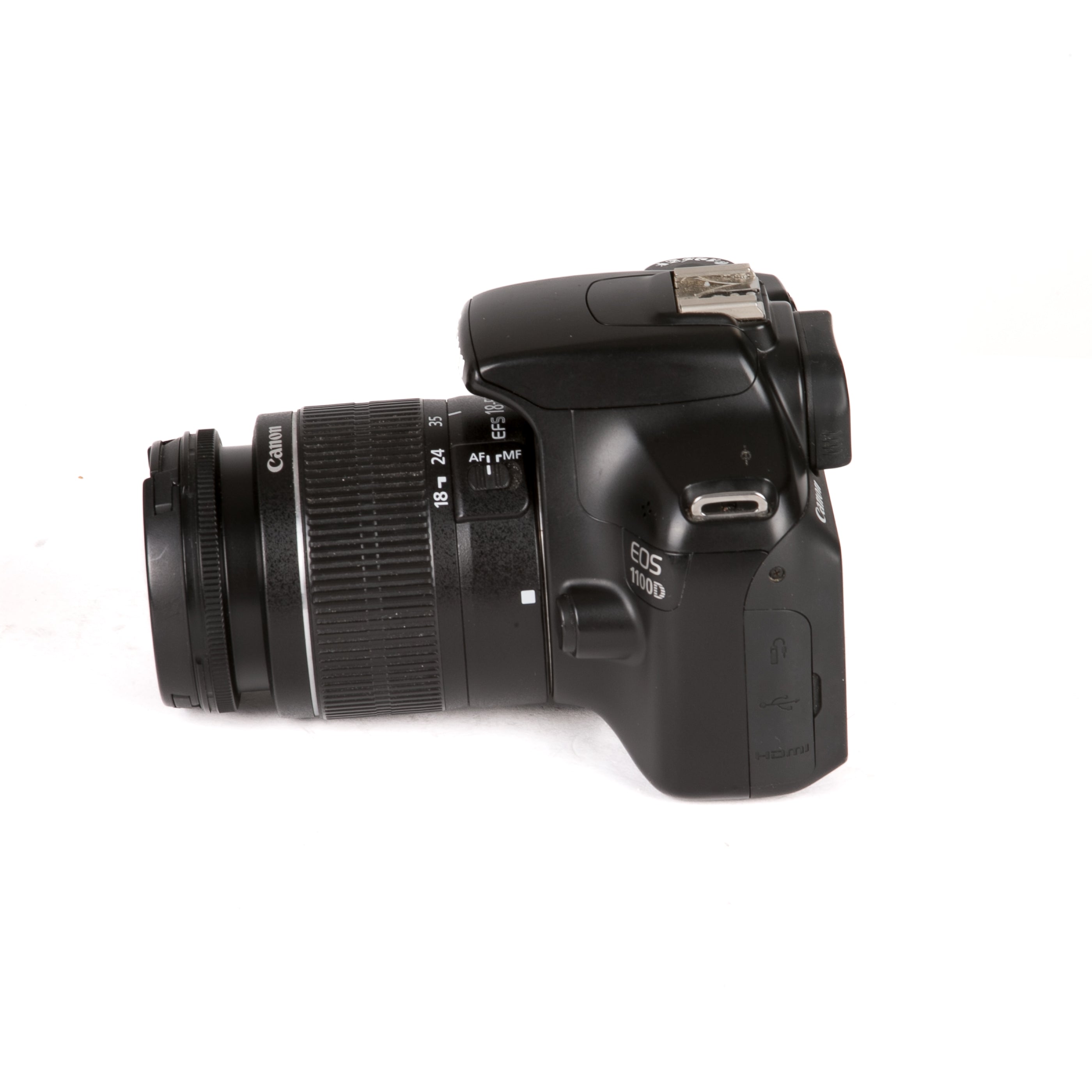Canon EOS 1100D + 18-55 DC III